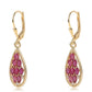 Goldplattierte Silberohrringe mit Rubin aus Mosambik und weißem Topas