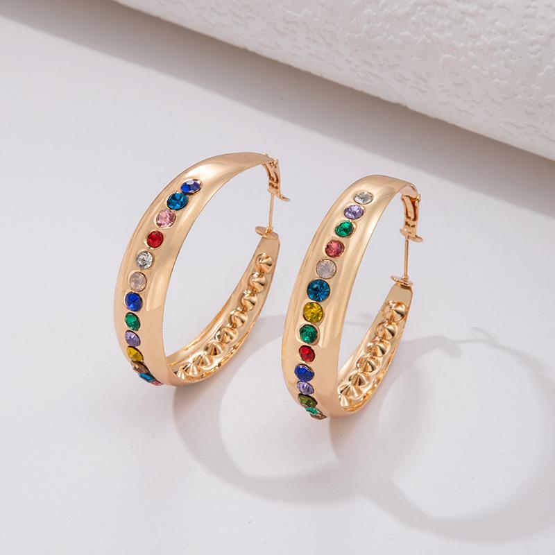 Ohrringe aus goldplattierter Legierung mit rotem Emporia®-Kristall und blauem Emporia®-Kristall