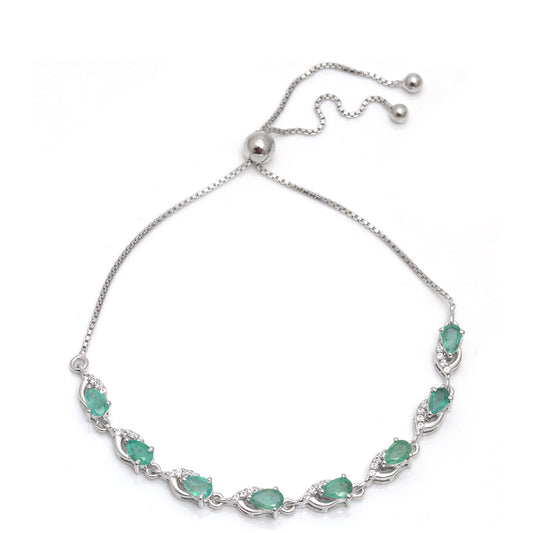 Silberarmband mit brasilianischem Smaragd und weißem Topas