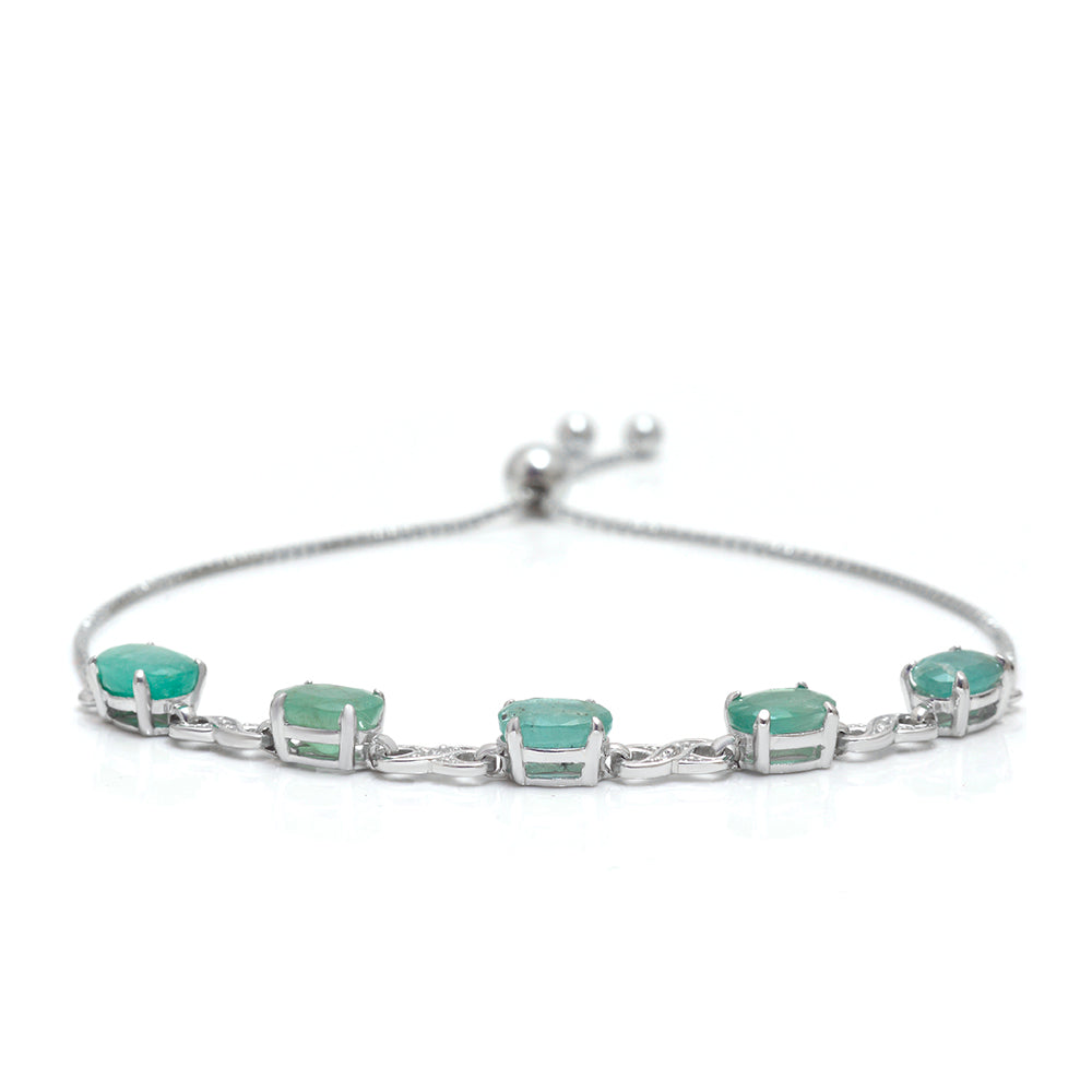 Silberarmband mit brasilianischem Smaragd und weißem Topas