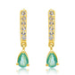 Goldplattierte Silberohrringe mit brasilianischem Smaragd und weißem Topas