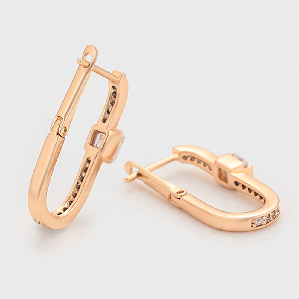 Ohrringe aus goldplattierter Legierung mit weißem Emporia® Kristall