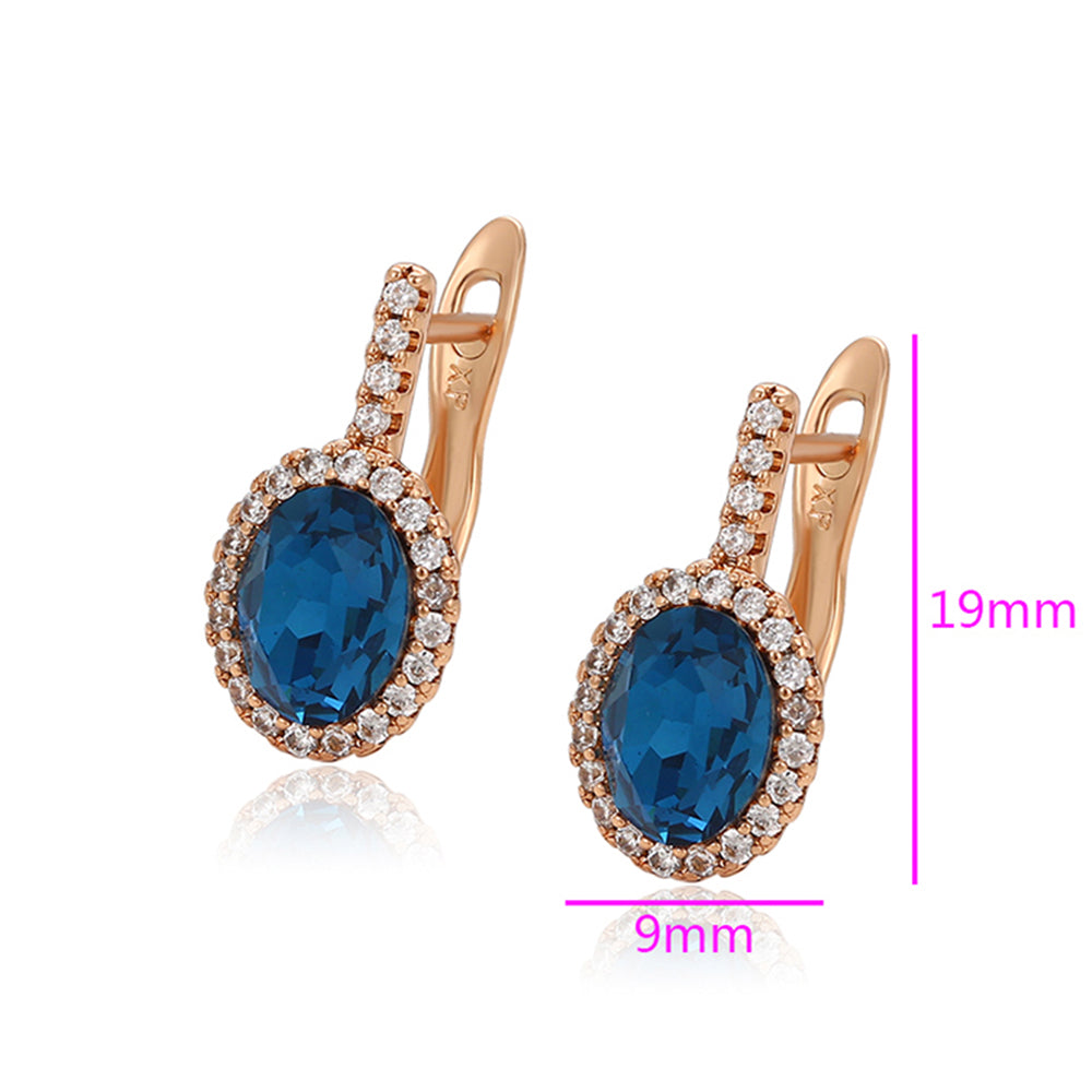 Ohrringe aus goldplattierter Legierung mit blauem Emporia®-Kristall und weißem Emporia® Kristall 2 