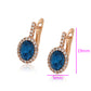 Ohrringe aus goldplattierter Legierung mit blauem Emporia®-Kristall und weißem Emporia® Kristall