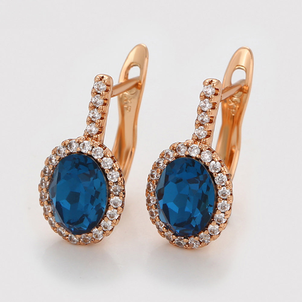Ohrringe aus goldplattierter Legierung mit blauem Emporia®-Kristall und weißem Emporia® Kristall 4 