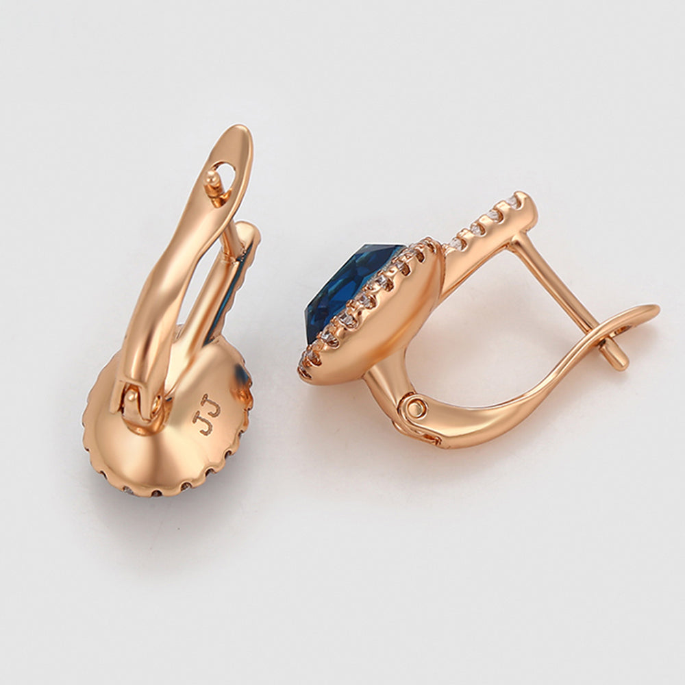 Ohrringe aus goldplattierter Legierung mit blauem Emporia®-Kristall und weißem Emporia® Kristall