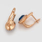 Ohrringe aus goldplattierter Legierung mit blauem Emporia®-Kristall und weißem Emporia® Kristall