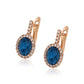 Ohrringe aus goldplattierter Legierung mit blauem Emporia®-Kristall und weißem Emporia® Kristall