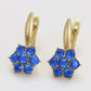 Ohrringe aus goldplattierter Legierung mit blauem Emporia®-Kristall