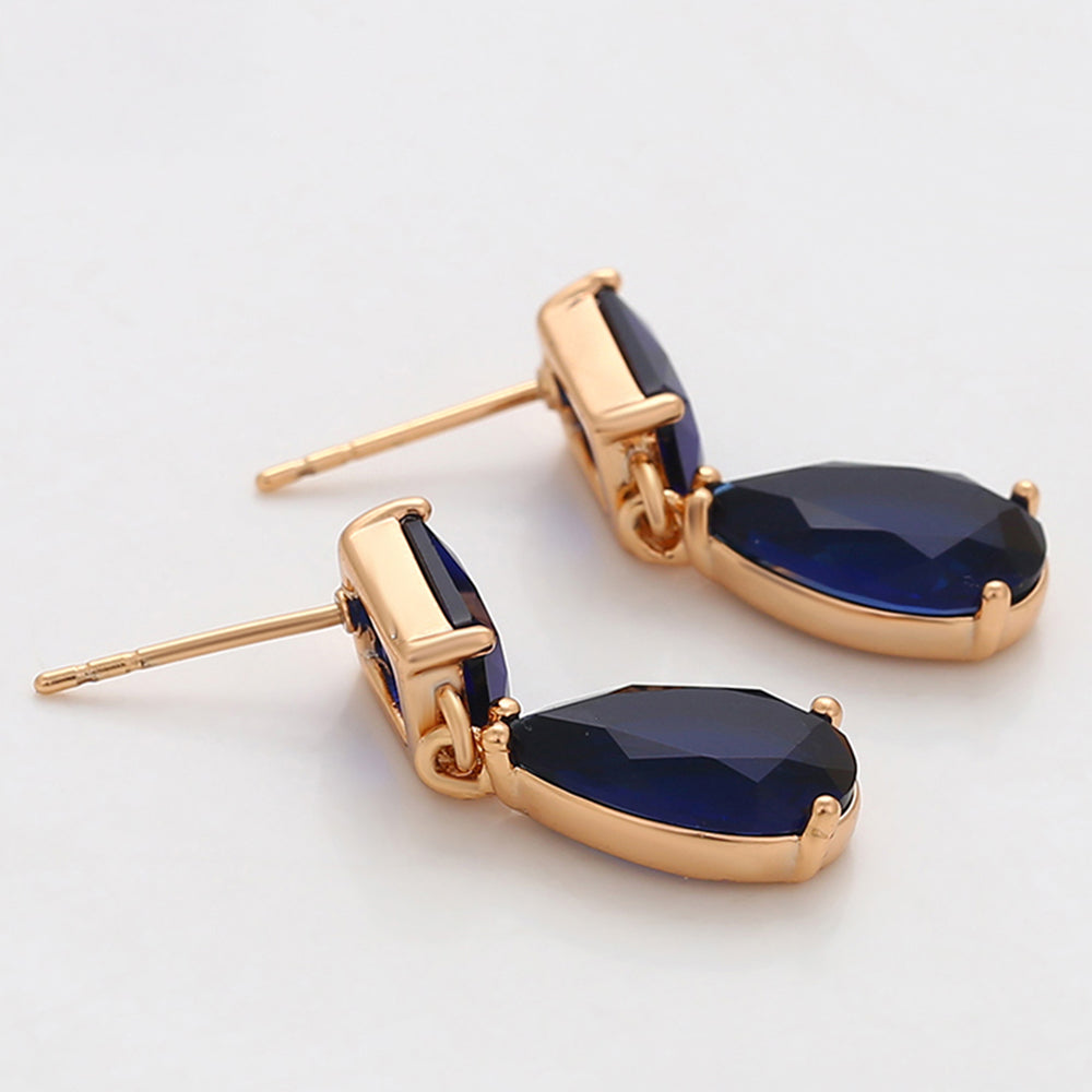 Ohrringe aus goldplattierter Legierung mit blauem Emporia®-Kristall