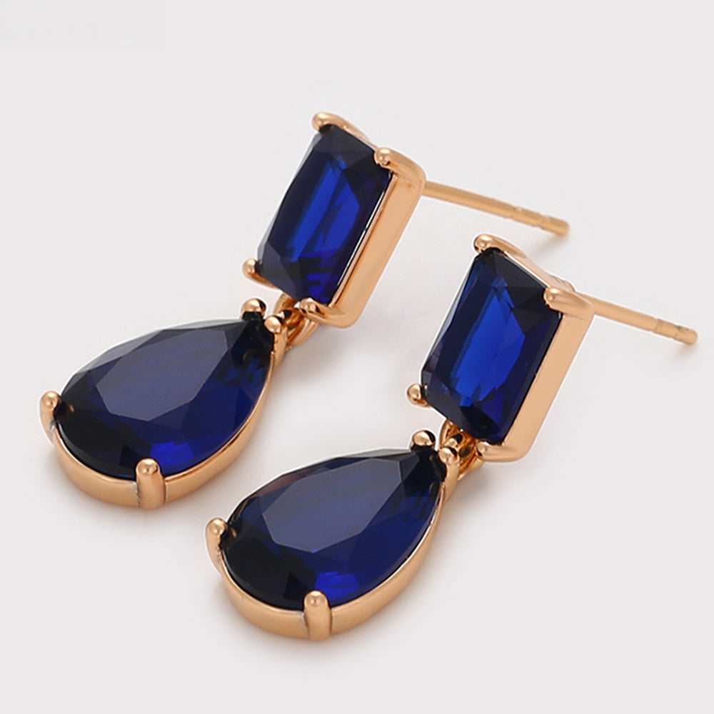 Ohrringe aus goldplattierter Legierung mit blauem Emporia®-Kristall 7 