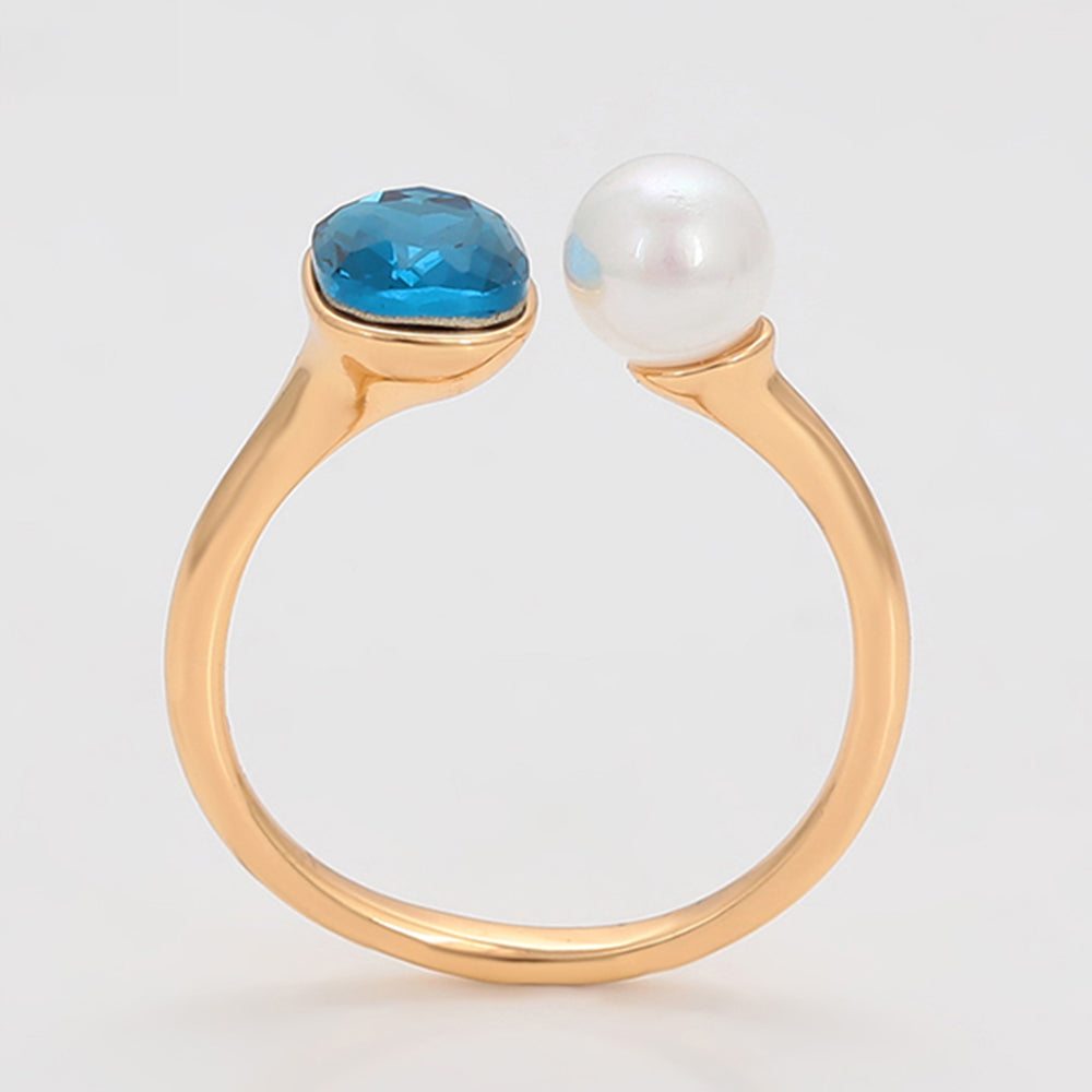 Ring aus goldplattierterr Legierung mit Glasperle und blauem Emporia®-Kristall 4 
