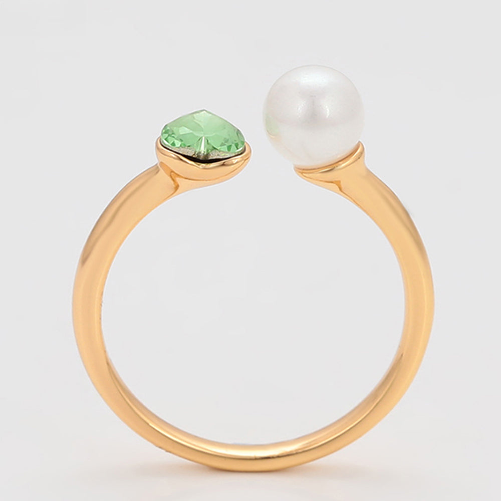 Ring aus goldplattierterr Legierung mit Glasperle und grünem Emporia® Kristall 4 