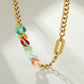 Halskette aus goldplattierter Legierung mit rotem Emporia®-Kristall und blauem Emporia®-Kristall