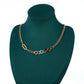 Halskette aus goldplattierter Legierung mit rotem Emporia®-Kristall und blauem Emporia®-Kristall