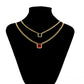 Halskette aus goldplattierter Legierung mit rotem Emporia®-Kristall und grünem Emporia® Kristall