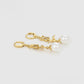 Ohrringe aus goldplattierter Legierung mit Glasperle und weißem Emporia® Kristall