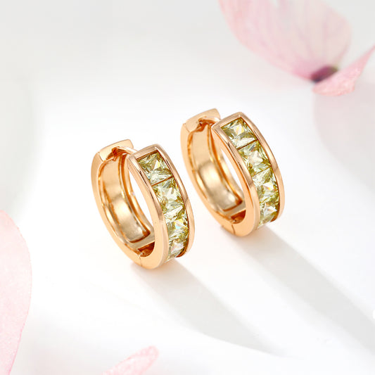 Ohrringe aus goldplattierter Legierung mit grünem Emporia® Kristall