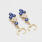 Ohrringe aus goldplattierter Legierung mit blauem Emporia®-Kristall und weißem Emporia® Kristall