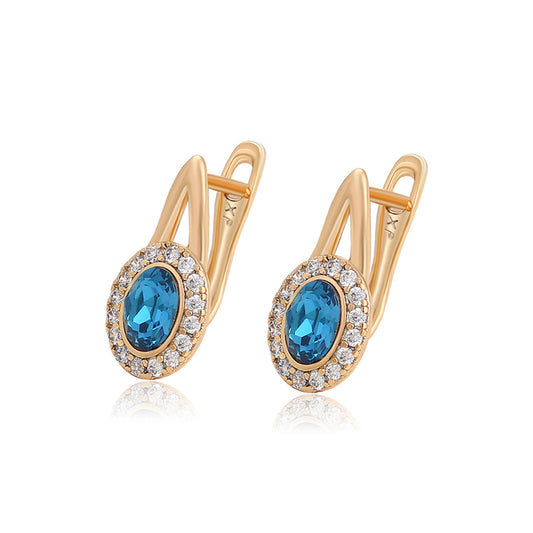 Ohrringe aus goldplattierter Legierung mit blauem Emporia®-Kristall und weißem Emporia® Kristall