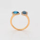 Ring aus goldplattierterr Legierung mit blauem Emporia®-Kristall und weißem Emporia® Kristall