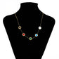 Halskette aus goldplattierter Legierung mit rotem Emporia®-Kristall und blauem Emporia®-Kristall