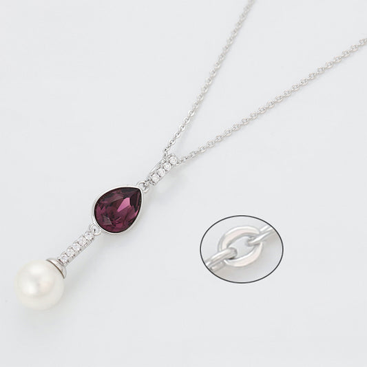 Halskette aus goldplattierter Legierung mit purpurfarbenem Emporia® Kristall und Glasperle
