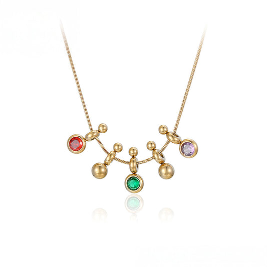 Halskette aus goldplattierter Legierung mit grünem Emporia® Kristall und rotem Emporia®-Kristall