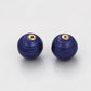 Talisman aus goldplattierter Legierung mit blauem Emporia®-Kristall