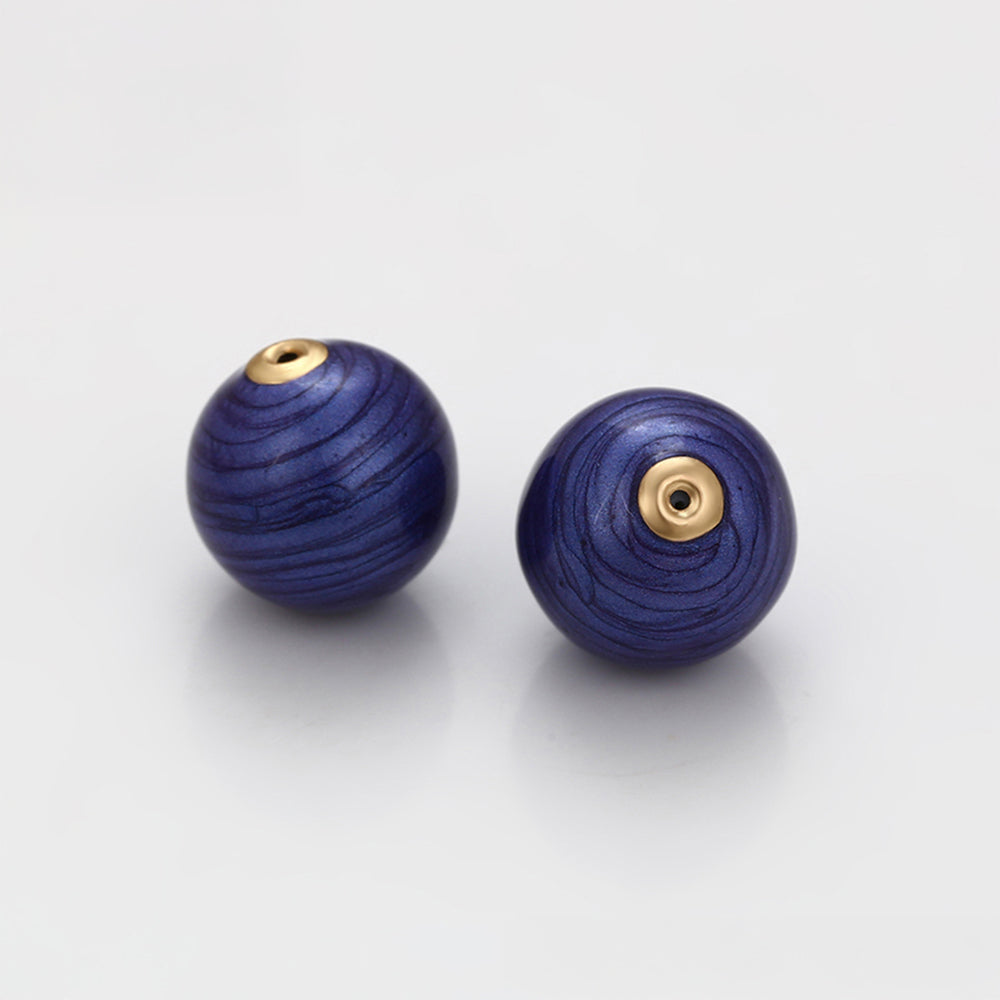 Talisman aus goldplattierter Legierung mit blauem Emporia®-Kristall