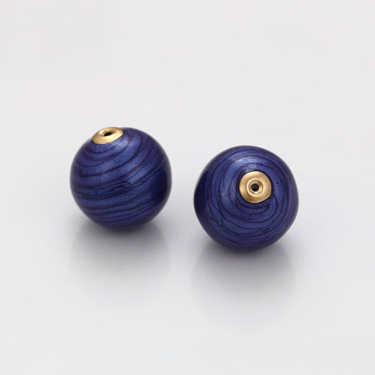 Talisman aus goldplattierter Legierung mit blauem Emporia®-Kristall