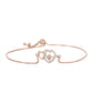 Rosevergoldetes Silberarmband mit rosafarbenem tanzendem Diamanten und weißem Topas