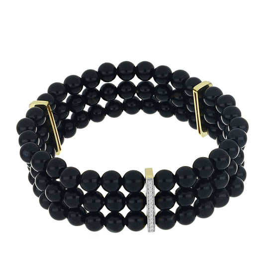 Goldplattiertes Silberarmband mit schwarzem Onyx und weißem Topas