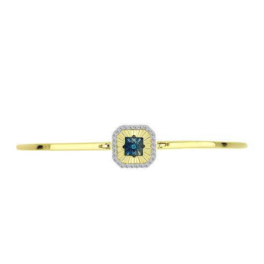 Goldplattierter Silberarmreif mit blauem Diamant und weißem Topas