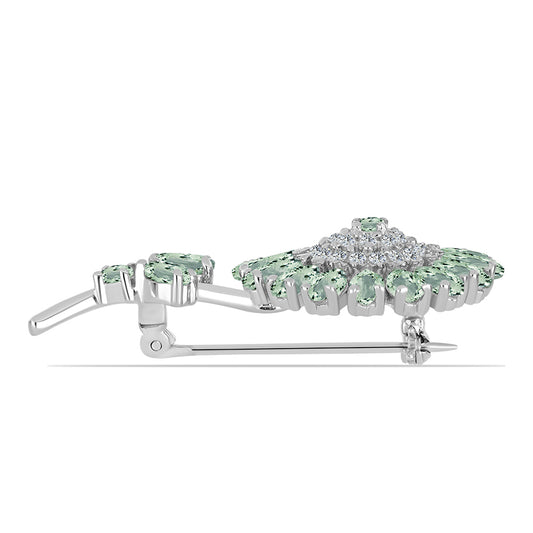 Silberbrosche mit grünem Amethyst und weißem Topas