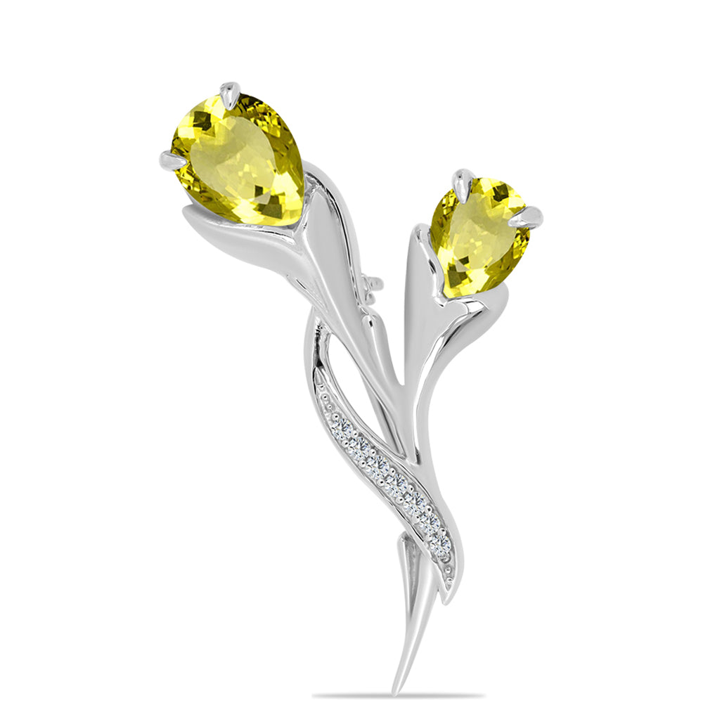 Silberbrosche mit Zitronentopas und weißem Topas