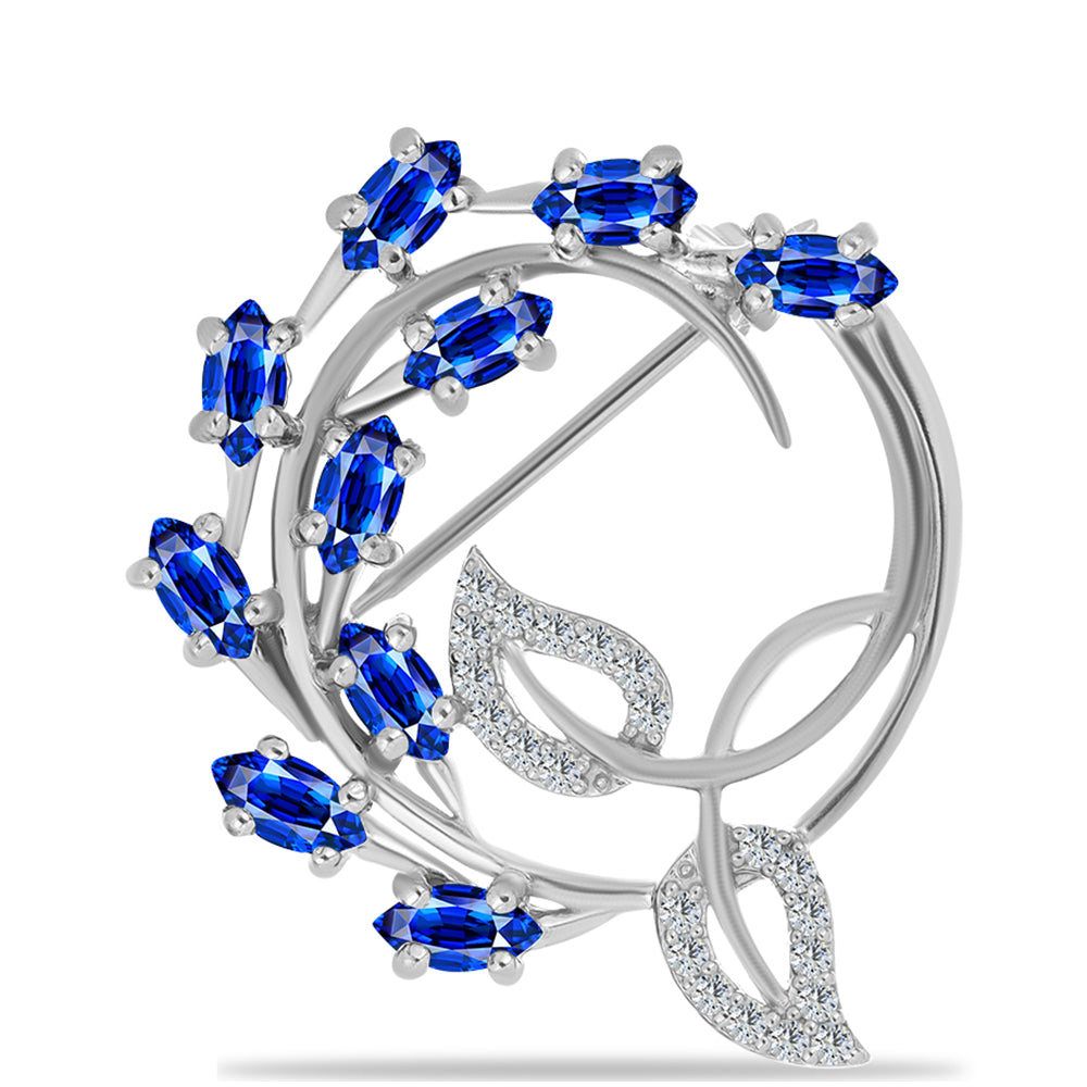 Silberbrosche mit australischem blauem Saphir und weißem Topas 1 
