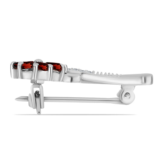 Silberbrosche mit Barton Granat und weißem Topas