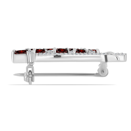 Silberbrosche mit Barton Granat und weißem Topas