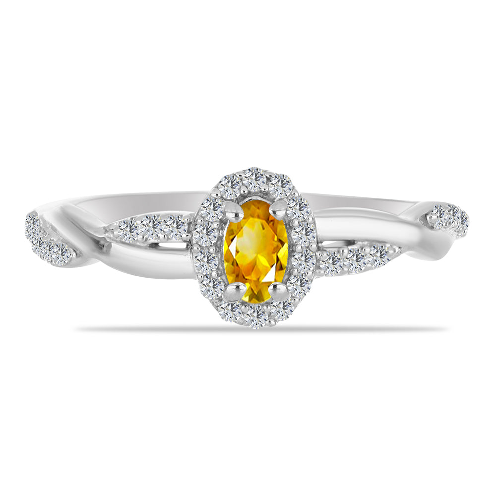 Silberring mit Zitrin aus dem Ural und weißem Topas