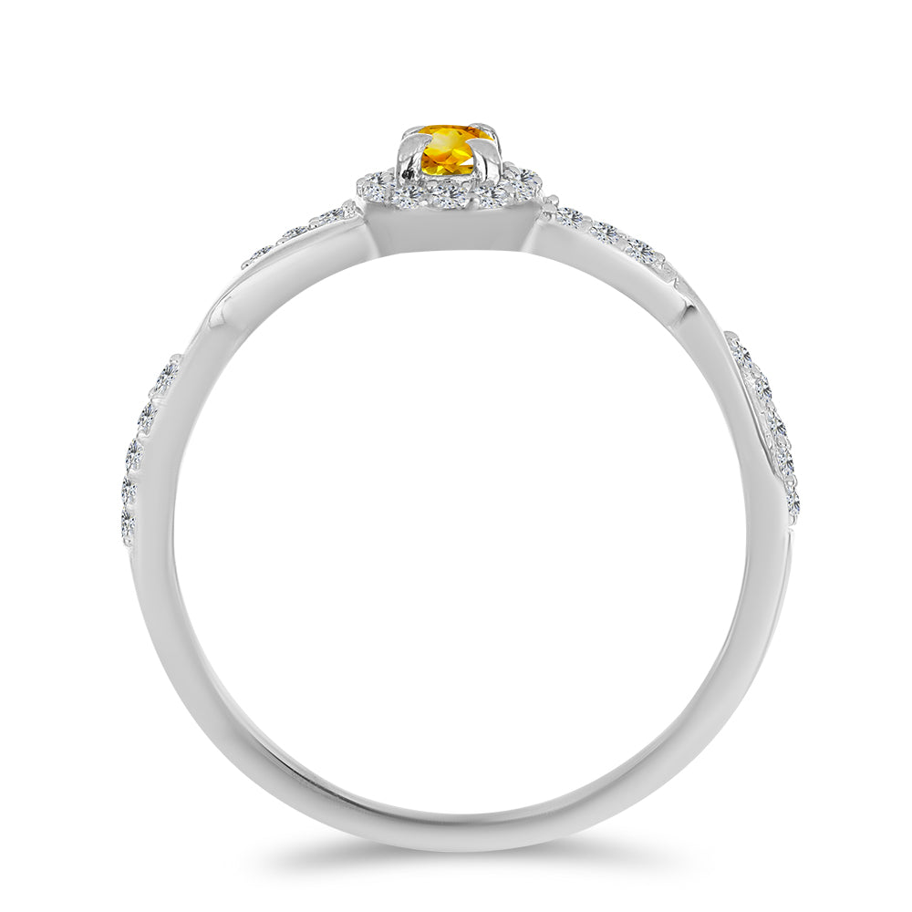 Silberring mit Zitrin aus dem Ural und weißem Topas