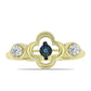 Goldplattierter Silberring mit blauem tanzendem Diamanten und weißem Topas