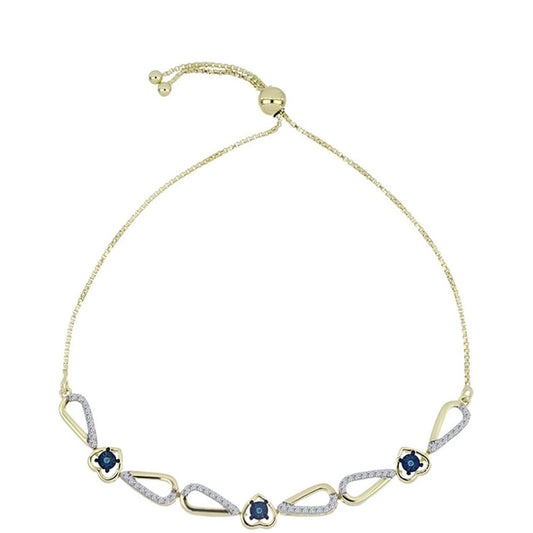 Goldplattiertes Silberarmband mit blauem tanzendem Diamanten und weißem Topas