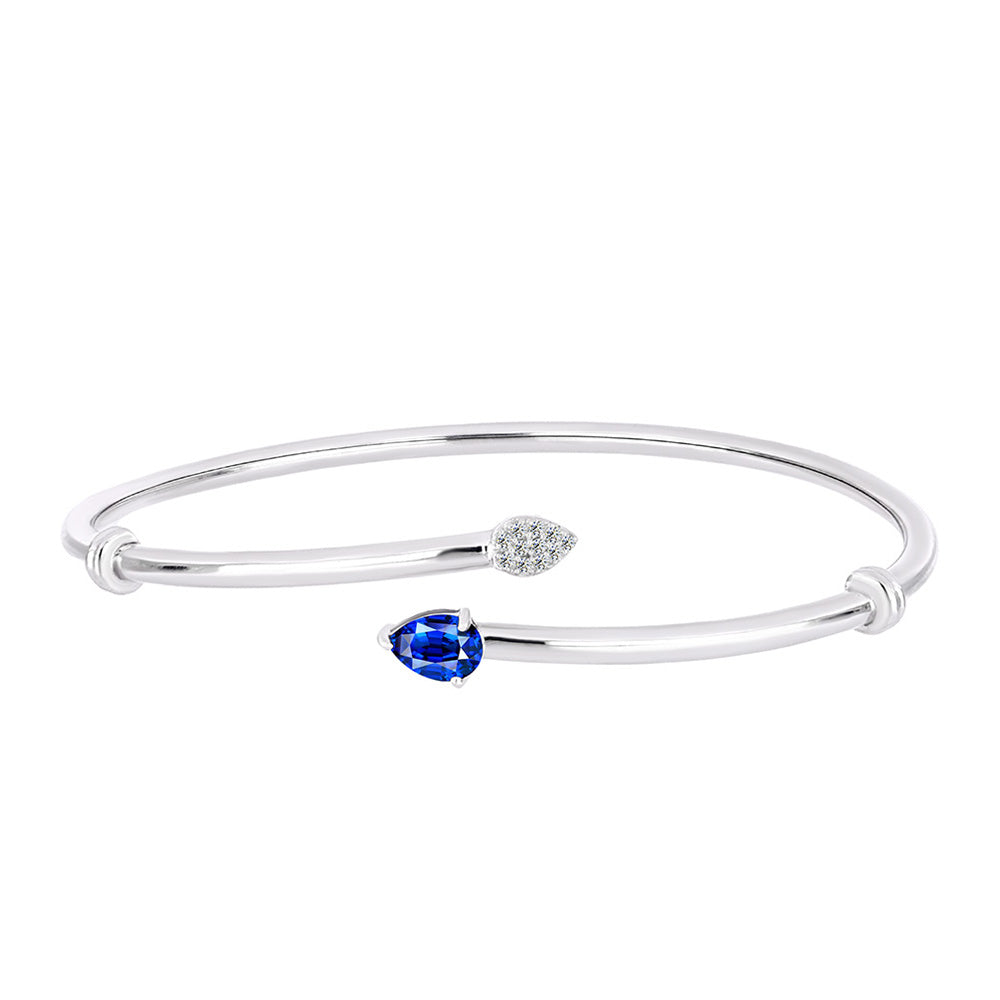 Silberarmreif mit australischem blauem Saphir und weißem Topas