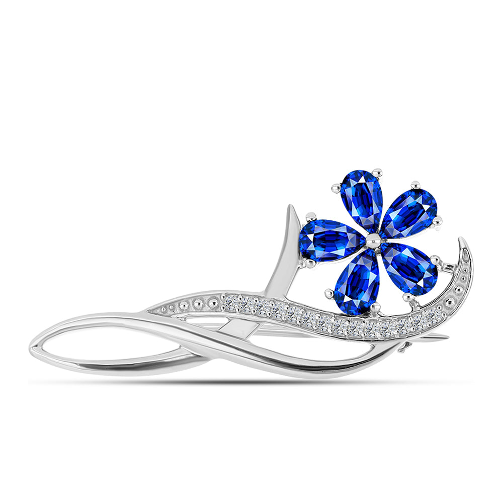Silberbrosche mit australischem blauem Saphir und weißem Topas