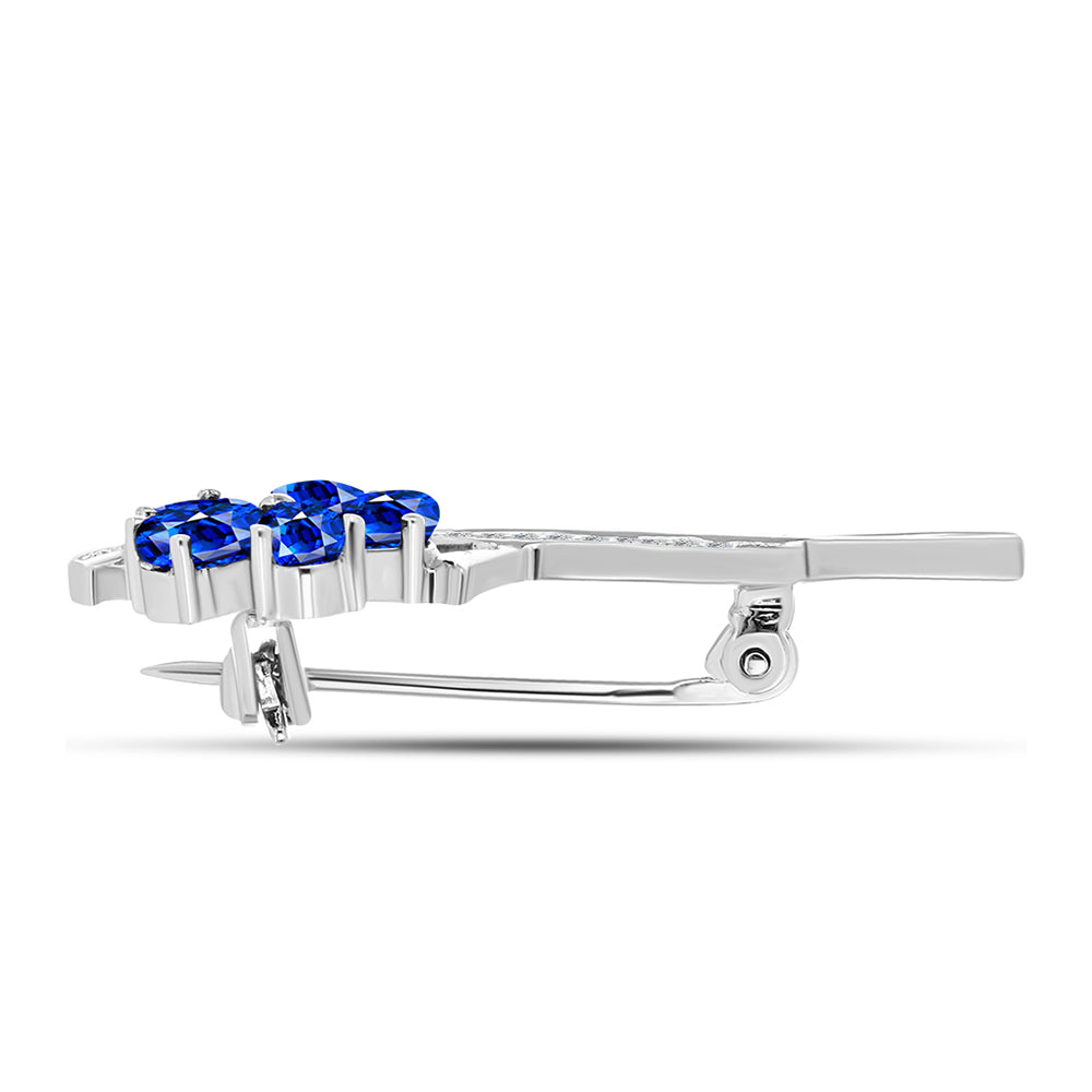 Silberbrosche mit australischem blauem Saphir und weißem Topas