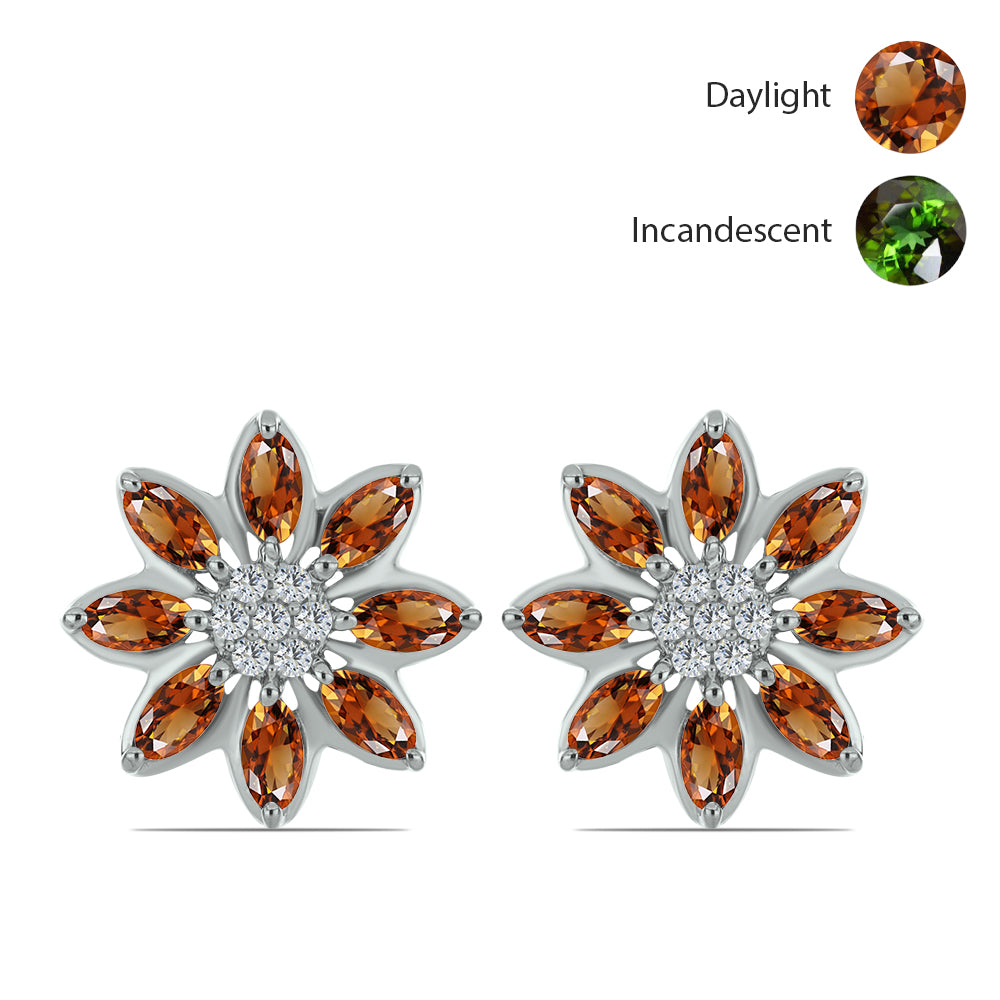 Silberohrringe mit zertifiziertem laborgezüchteten Zultanit aus Anatolien und weißem Topas