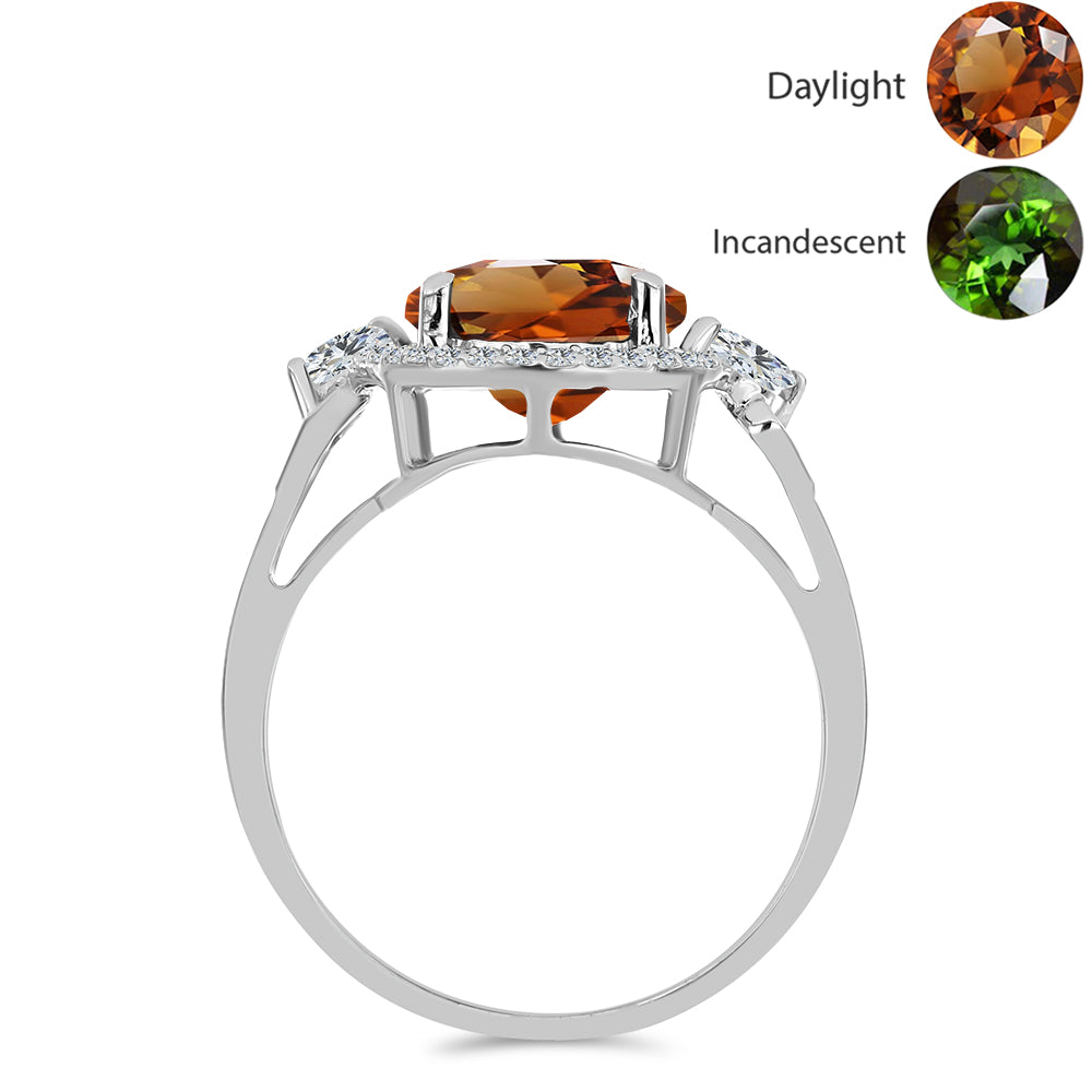 Silberring mit zertifiziertem laborgezüchteten Zultanit aus Anatolien und weißem Topas 2 