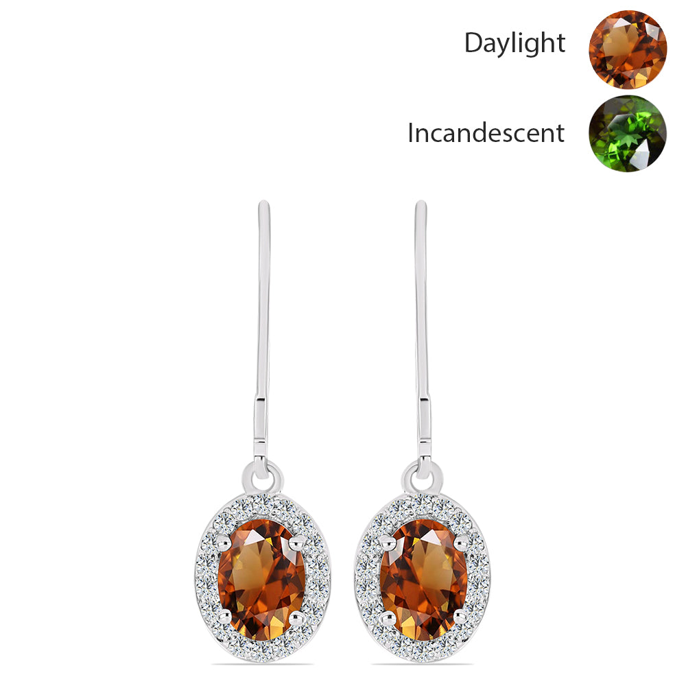 Silberohrringe mit zertifiziertem laborgezüchteten Zultanit aus Anatolien und weißem Topas 1 