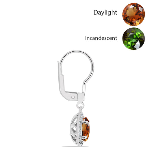 Silberohrringe mit zertifiziertem laborgezüchteten Zultanit aus Anatolien und weißem Topas